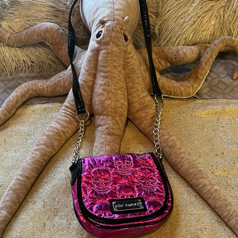 Pink skull crossover purse from Betsey Johnson